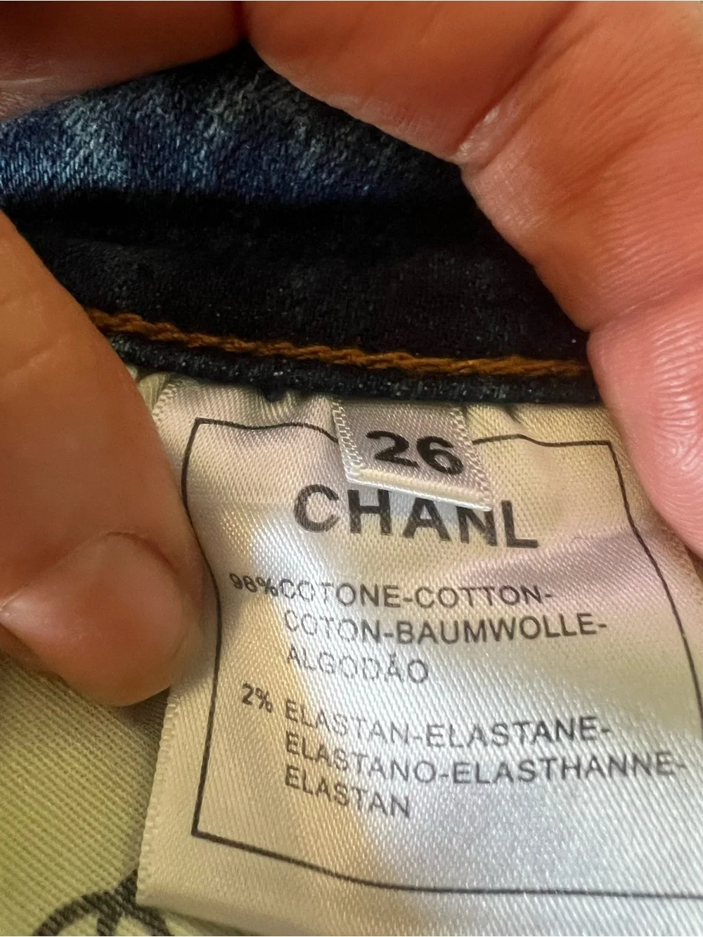 CHANEL Women's Blue Skinny Jeans with Gold-Tone Studs